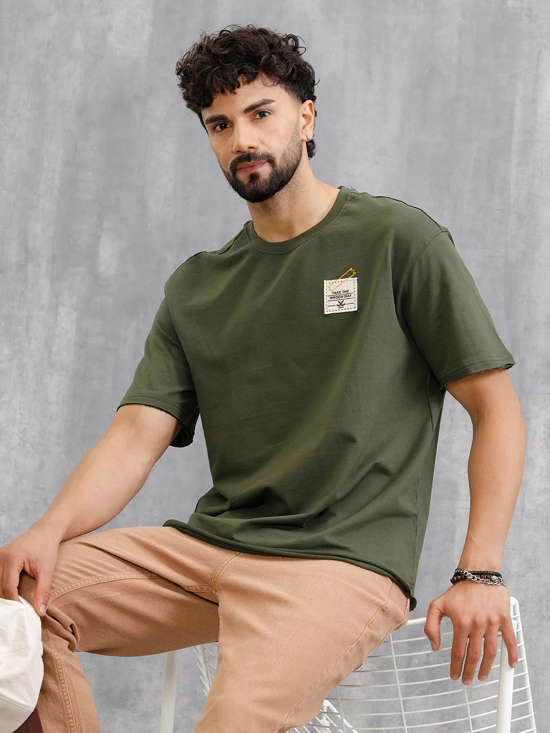 Solid Oversized T-Shirt With Printed Canvas Patch And Raw Edge Detail | Olive