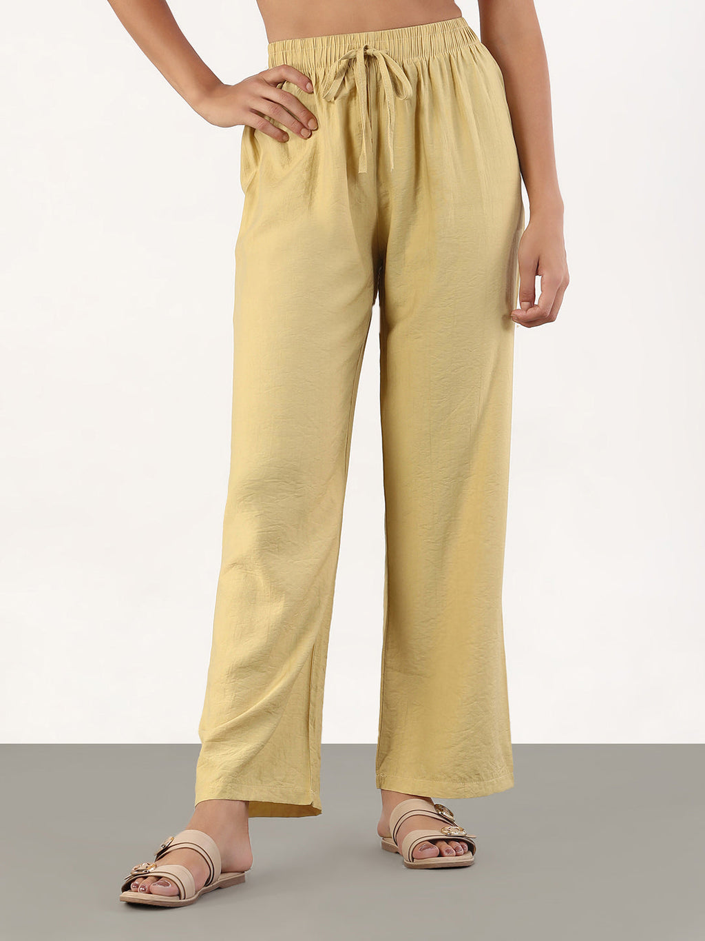 Women's Beige Loose Fit Solid Parallel Trousers