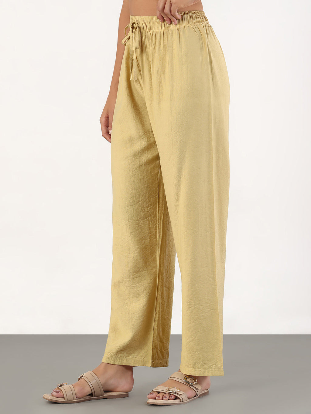 Women's Beige Loose Fit Solid Parallel Trousers