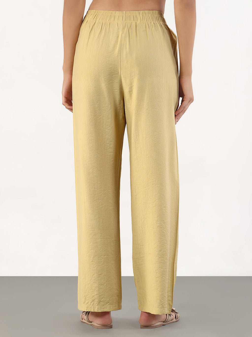 Women's Beige Loose Fit Solid Parallel Trousers
