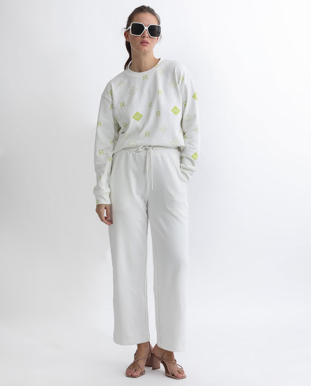 Rareism Women's Pazoo T Off White Cotton Blend Plain Ankle Length Flared Track Pant