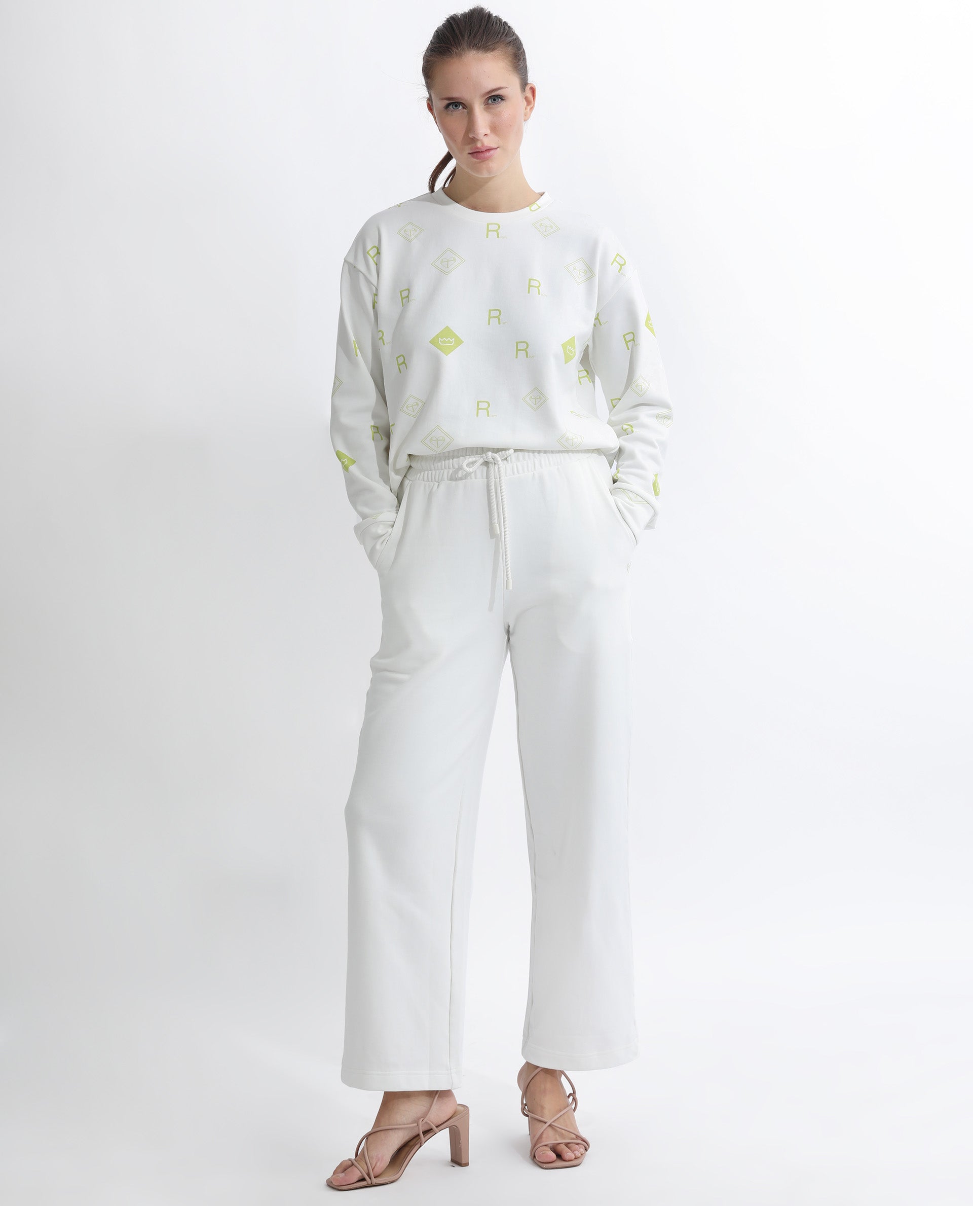 Rareism Women's Pazoo T Off White Cotton Blend Plain Ankle Length Flared Track Pant