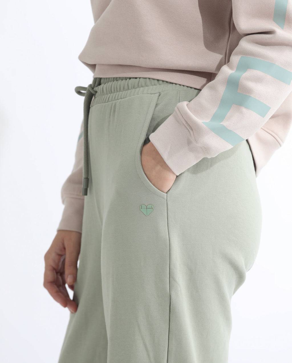 Rareism Women's Pazoo T Dusky Green Cotton Blend Plain Ankle Length Flared Track Pant