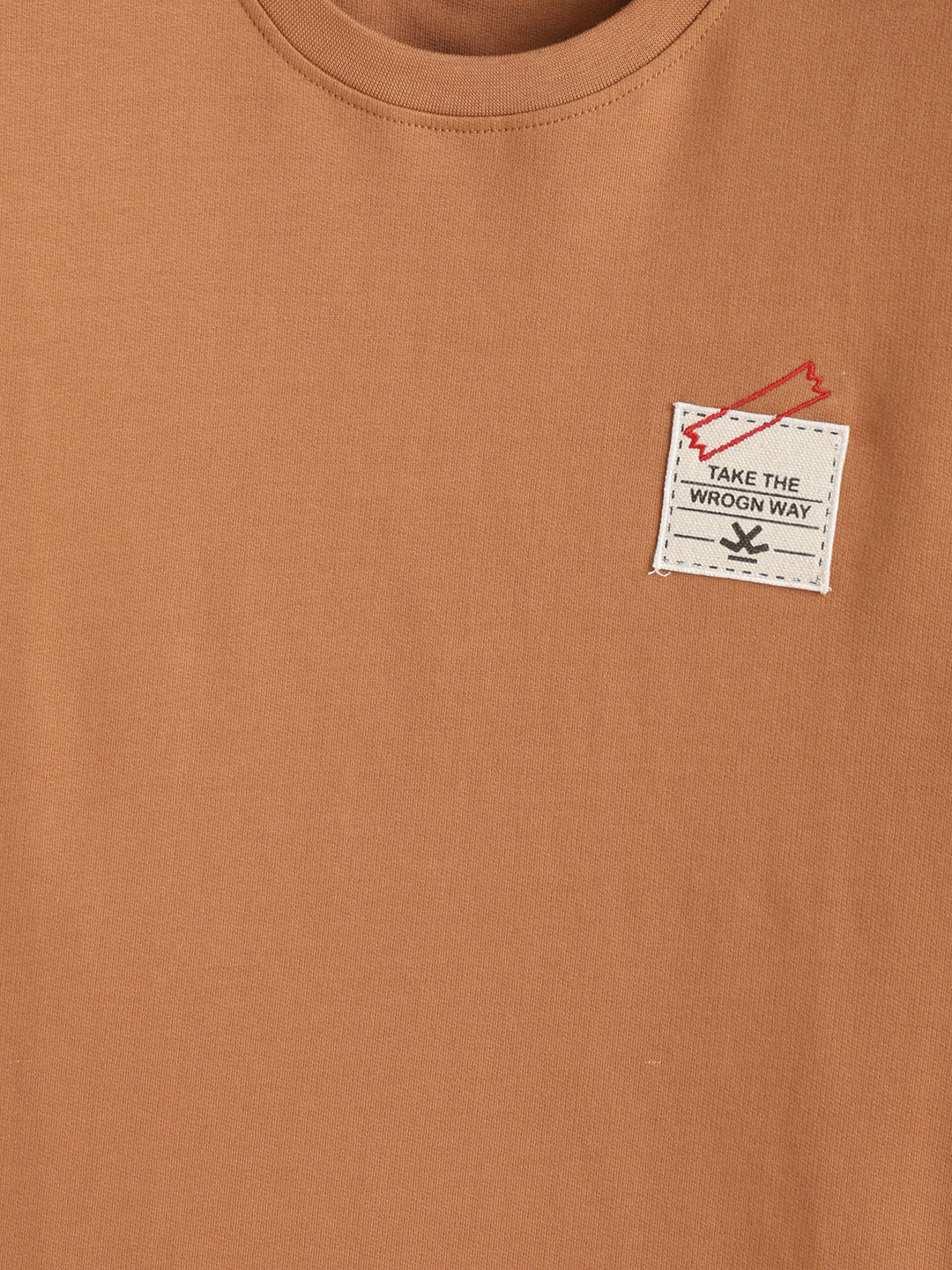 Solid Oversized T-Shirt With Printed Canvas Patch And Raw Edge Detail | Brown